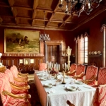 Private dining room at Chateau Loucen prepared for an intimate candlelit dinner.