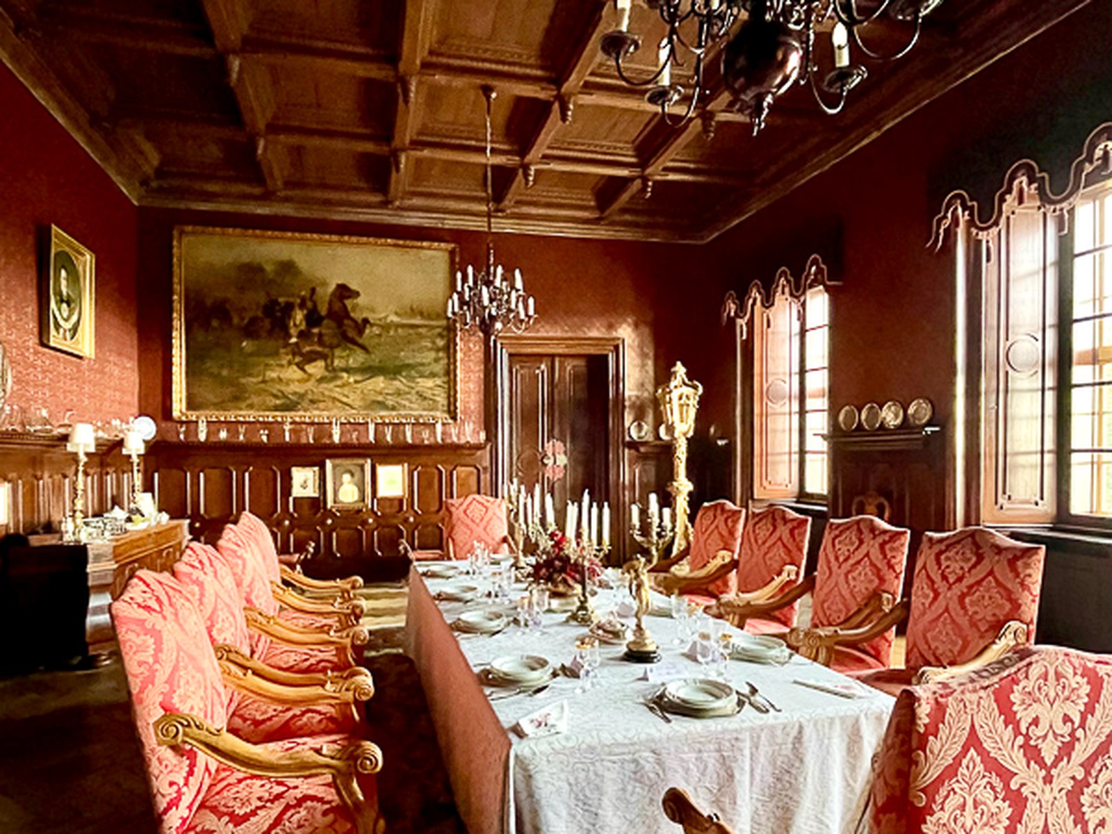 Private dining room at Chateau Loucen prepared for an intimate candlelit dinner.